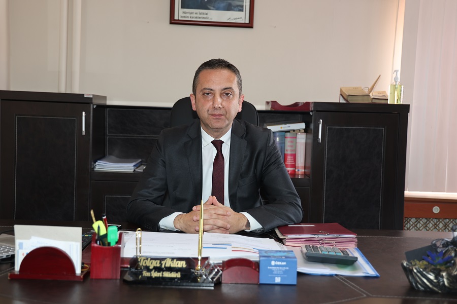 TOLGA AKTAN